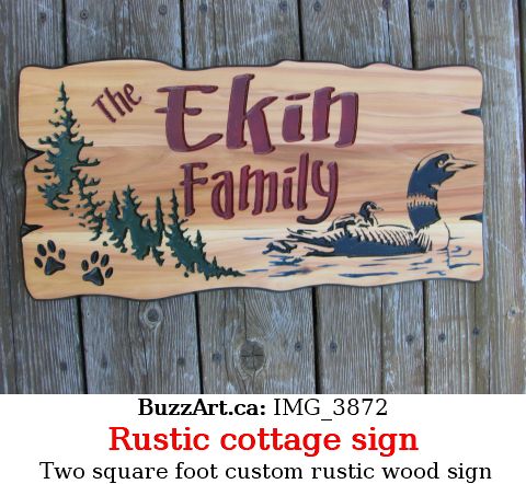 custom wood sign Loon, trees and paw prints